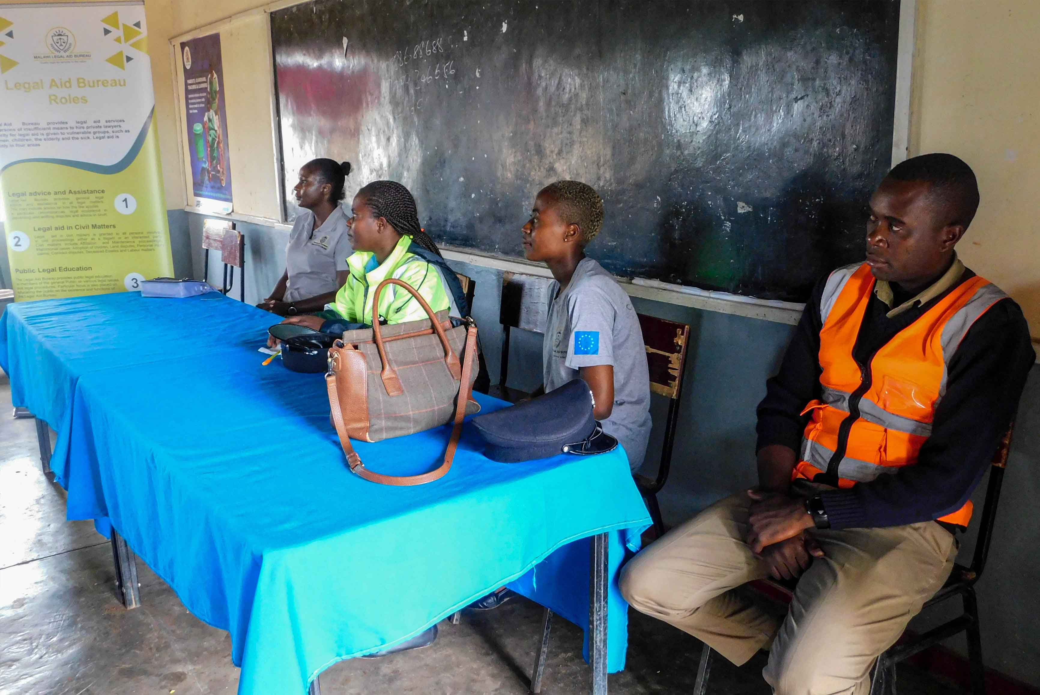 LAB officers with police officers during a meeting