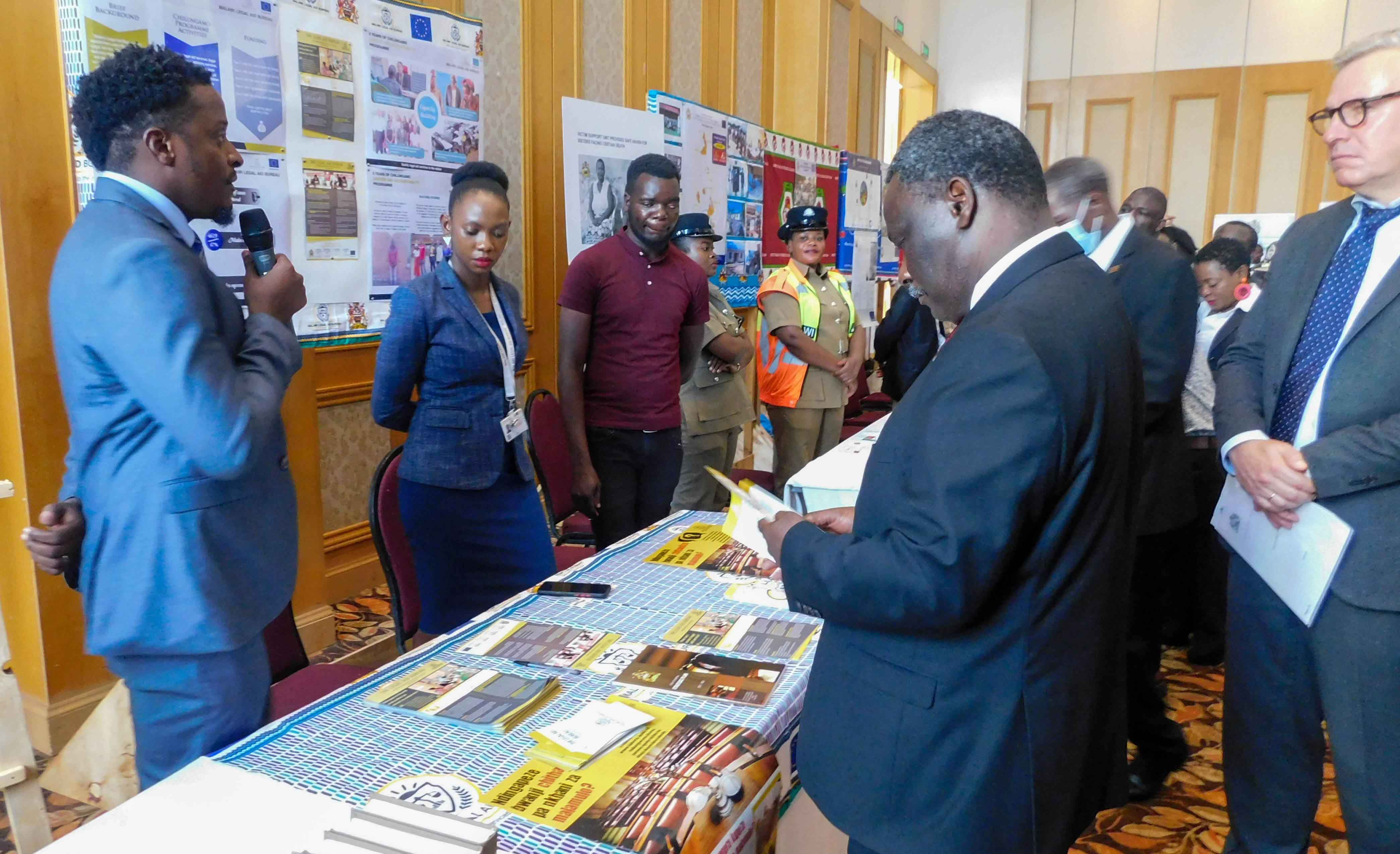 Principal Planning Officer Panganeni Ndovi making a presentation to Chief Justice