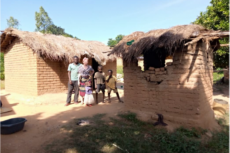 Tenga Ngulu (second left) with her family members