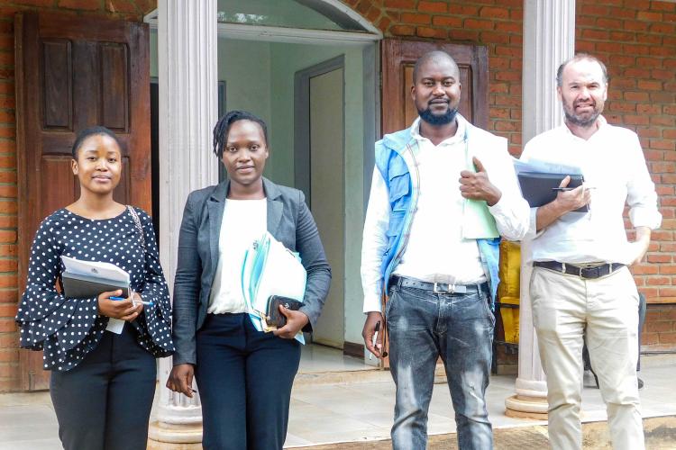 Ruth Harawa with others after court