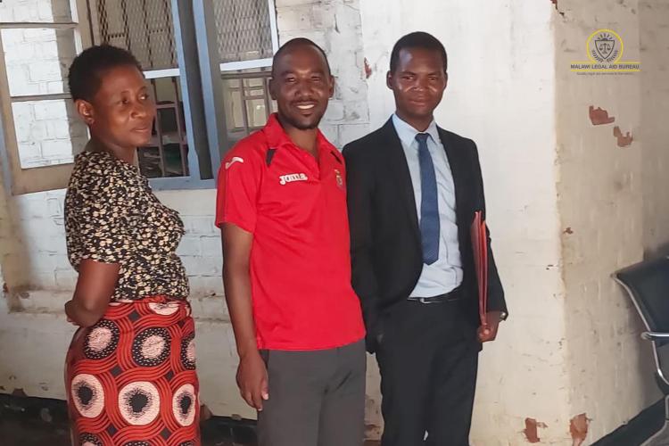 Gomani (in red) with sister in-law and Counsel Ching'anda